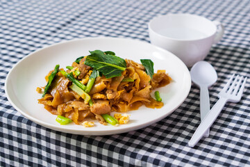 Stir fried soy sause noodles with pork
