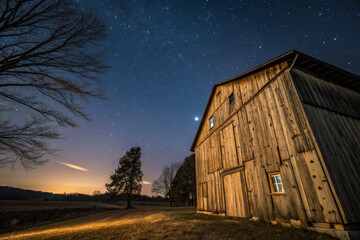 rustic wooden barn under starry night sky, showcasing beauty of nature and tranquility. scene captures essence of rural life and vastness of universe