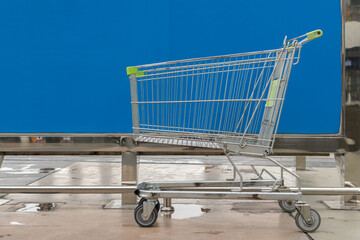 Minimalism style, Shopping cart and blue wall.