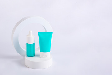 Cosmetic bottle, Skin care or sunscreen cosmetic with stylish props on white background. 
