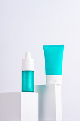 Cosmetic bottle, Skin care or sunscreen cosmetic with stylish props on white background. 
