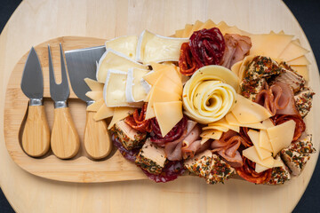 Food trend gift aperitivo party idea. Appetizers wooden grazing board with different antipasti...
