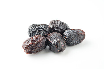 Dates fruit ajwa or kurma ajwa, isolated on white background