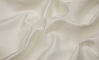 Obraz premium White fabric background. Selective focus.