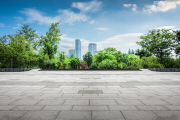 Serene Urban Landscape with Lush Greenery and Modern Skyline