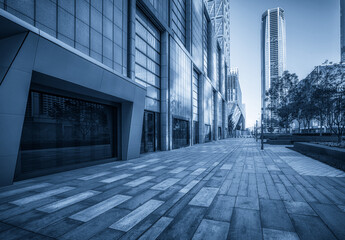 Modern Urban Architecture in Blue Monochrome With Sidewalk Perspective