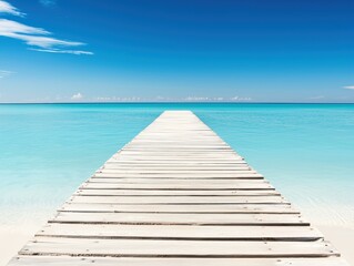 Obraz premium Weathered wooden boardwalk stretching into the horizon toward a calm turquoise ocean, lined with sun-bleached seashells and surrounded by a cloudless blue sky in a serene summer coastal landscape