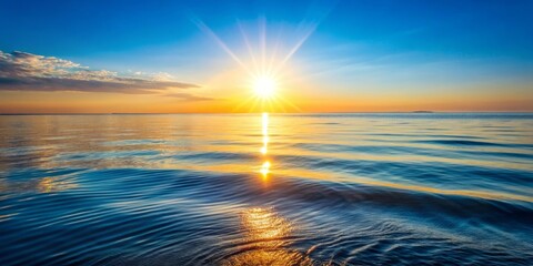 Obraz premium Golden Hour Serenity Sunbeams Dance on Gently Rippling Ocean Waters