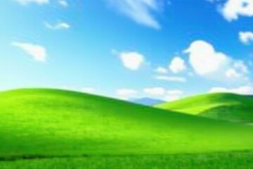 Fototapeta premium Blured vibrant green hills, clear blue sky, white cloudscape, hill, beautiful