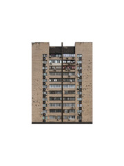 Old typical eleven-storey multistorey apartment building lined with beige tiles is isolated. 