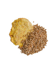A portion of buckwheat porridge with chop is isolated. Top view.