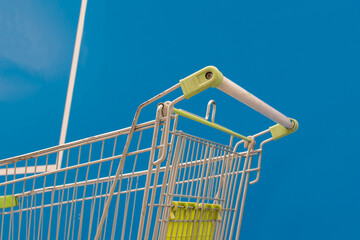 Minimalism style, Shopping cart and blue wall.