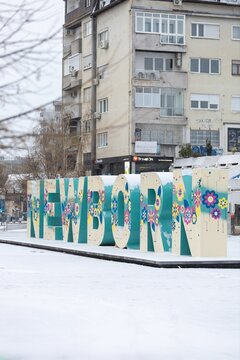 Newborn monument in snowy Pristina.