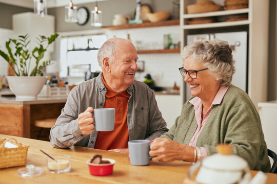 Lovely senior couple enjoying tea time at home - Powered by Adobe
