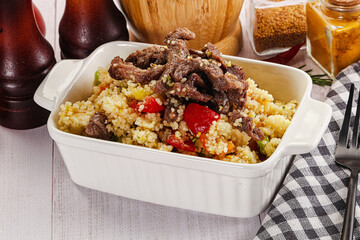 Traditional couscous with beef and vegetables