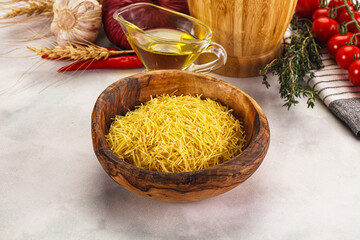 Raw dry Italian pasta Vermicelli
