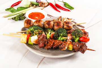 Asian grilled skewer assortment satay