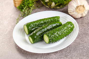 Homemade lighty salted cucumbers with herbs