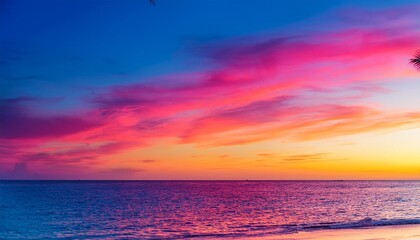 Obraz premium A vibrant blend of fuchsia, yellow, and azure blue, evoking the warmth and energy of a tropical sunset. The bold, bright colors capture the essence of a tropical heatwave, full of energy and life. 