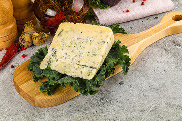 Blue cheese piece over board