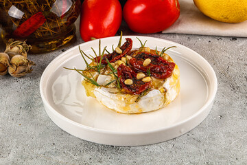 Baked camembert cheese with honey