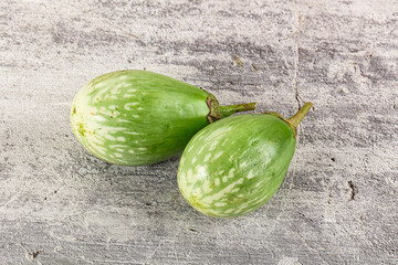 Ripe green mini eggplants heap
