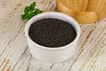 Black dry Nigella seeds in the bowl
