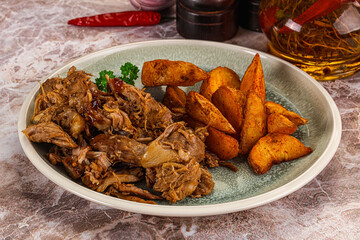 Baked shredded pork with potato