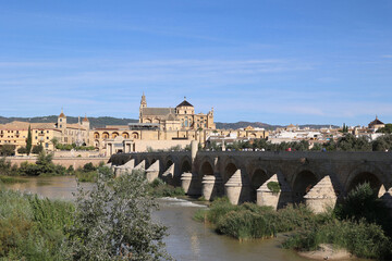 View of the skyline of the Spanish city of Cordoba with the Puente Romano-Roman Bridge Bridge on...