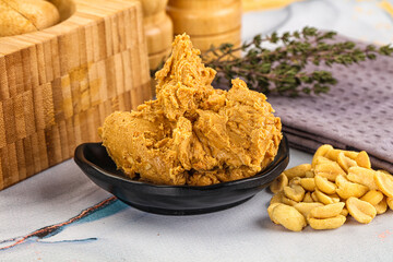 Crunchy peanut butter fat product