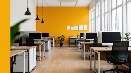 Modern Bright Office Space with Yellow Accent Wall and Desks