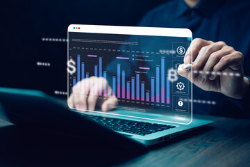 Working on laptops with Planning analysis and Project management online. Stock Market Investments and Digital Assets, analyzing forex trading graph financial data. Business finance background.