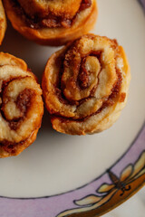 close up of mini cinnamon rolls on plate
