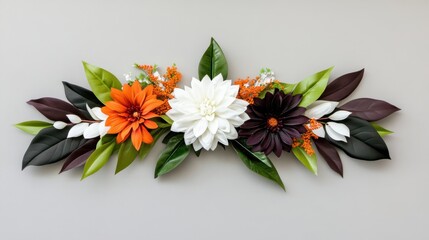 A floral arrangement with orange, white, and purple flowers. The arrangement is on a gray wall