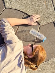 Heat and Dehydration Cause Woman to Faint