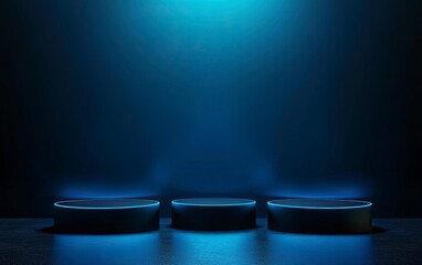 Obraz premium Abstract blue background with three pedestals for product presentation, a technology and science concept, with dark and light elements.
