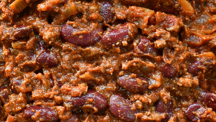 Chilli con carne. Traditional Mexican dishes. Food texture background.
