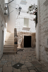 Exterior decoration and design at 'Polignano a Mare' southern Italian town on the edge of a craggy ravine pockmarked with caves and landscape of Adriatic sea- Puglia, Italy