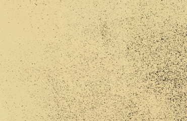 Beige grunge texture with black speckled dust and noise effects, ideal for vintage backgrounds.