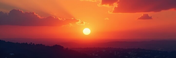 Obraz premium Golden sun dips below horizon, paints sky fiery orange and pink hues, silhouette, horizon