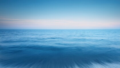 Tranquil seascape with soft ocean waters blending seamlessly into the horizon, creating a peaceful and meditative atmosphere with gentle waves and a calming color palette.