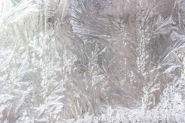 Frosted glass, ice texture. Winter background, natural frost pattern on window