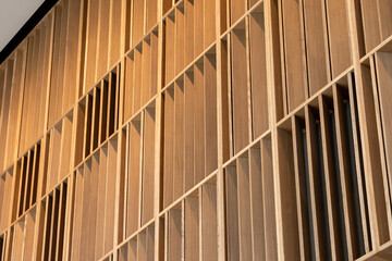 A wooden shelf with many shelves and a lot of empty space