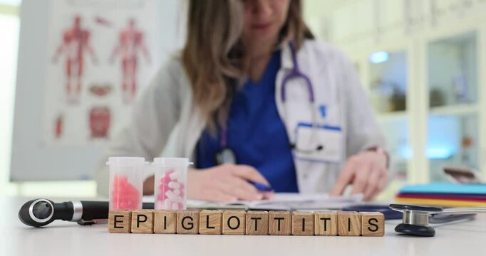 A healthcare professional is thoroughly reviewing key details and information about epiglottitis in a clinical setting