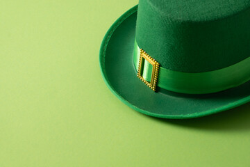 St Patricks day and March 17 concept with green parade Leprechaun Hat with belt on green...