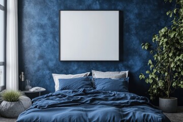 Blank canvas above a blue bed, plants and textured wall. Perfect for showcasing artwork, designs, or product mockups in a calming, stylish bedroom setting.