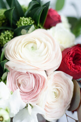 Mother Day greeting card. delicate bouquet featuring white, pink, and red ranunculus flowers creating romantic floral arrangement. Flowers gift for Women Day. Valentine's Day. March 8th. spring banner
