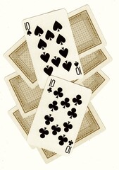 A montage of playing card backs with a pair of tens revealed in sepia.
