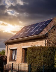 Fototapeta premium Detached residential house with solar panels on the roof