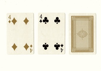 A hand of playing cards with a pair of the same value revealed in sepia.
